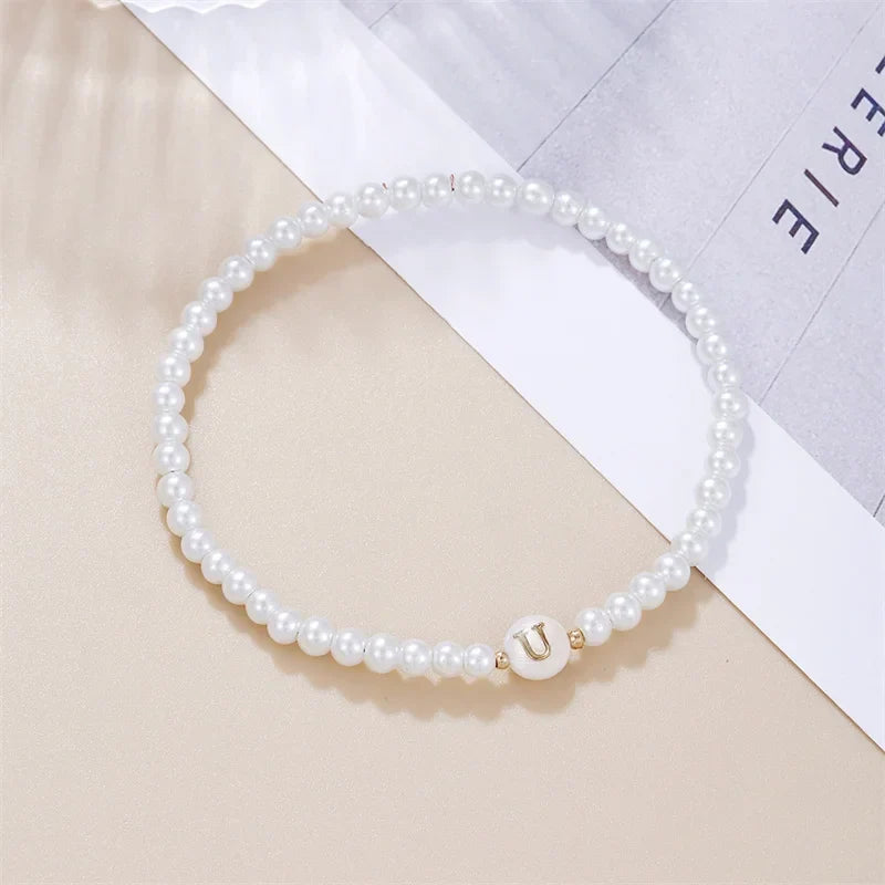 Bracelet blanc initiale u