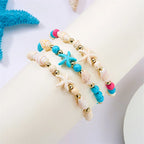 Bracelet cordon avec coquillage et étoile de mer bleu étoile