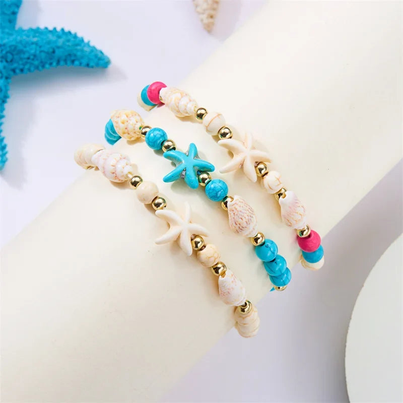 Bracelet cordon avec coquillage et étoile de mer bleu étoile