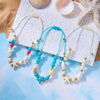 Bracelet cordon avec coquillage et étoile de mer blanc étoile