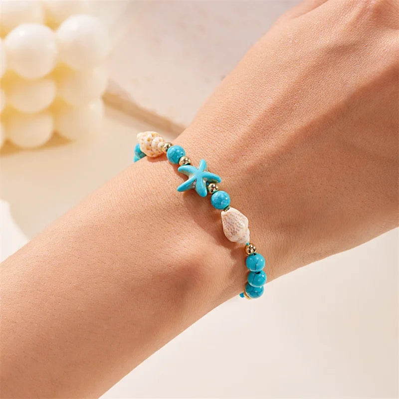 Bracelet cordon avec coquillage et étoile de mer bleu étoile