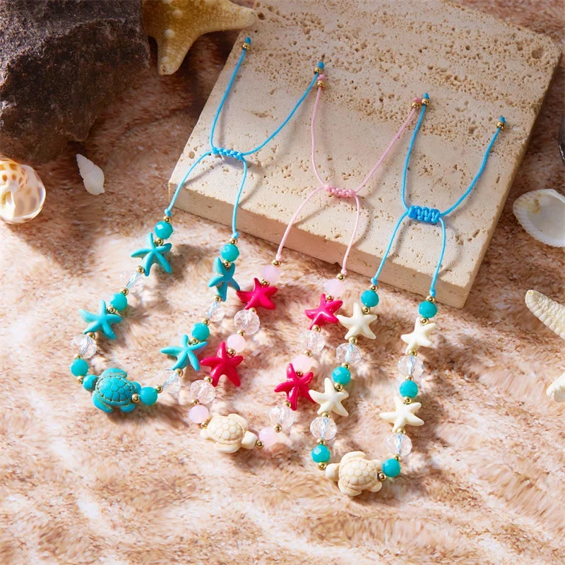 Bracelet cordon avec coquillage et étoile de mer bleu tortue