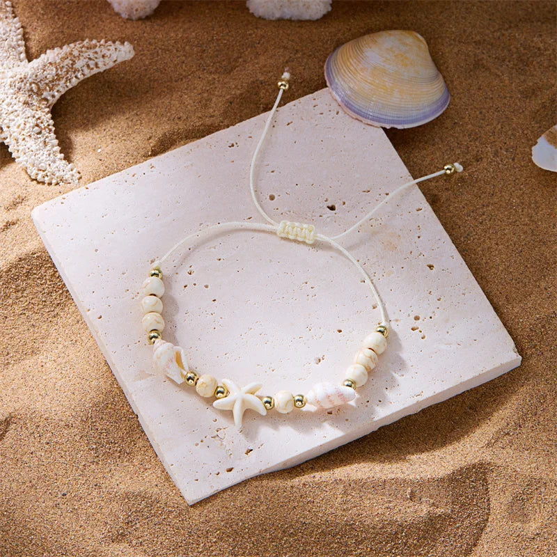 Bracelet cordon avec coquillage et étoile de mer blanc étoile