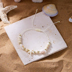 Bracelet cordon avec coquillage et étoile de mer blanc étoile