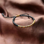 Tibetan Luck Bracelet in Black Cotton
