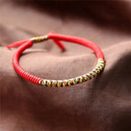 Tibetan Luck Bracelet in Red Cotton