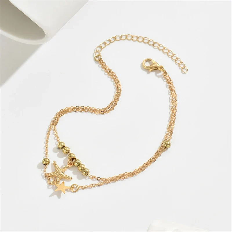 Women's gold starfish anklet