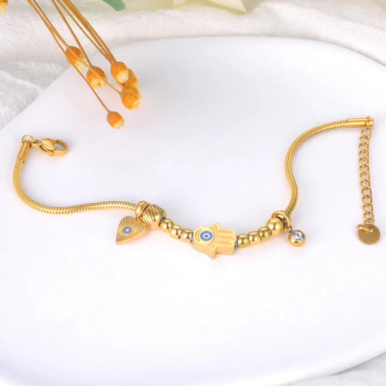 Protection Bracelet with Hand of Fatima and Blue Eye gold