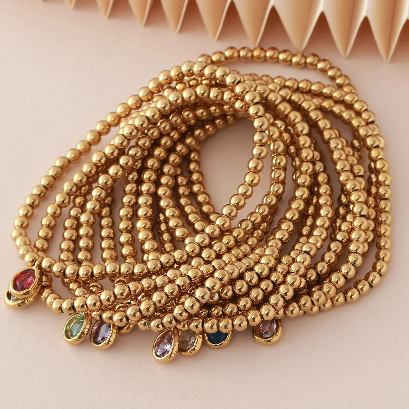 Bracelet doré avec pierre de naissance pour femme