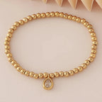 Bracelet doré avec pierre de naissance pour femme