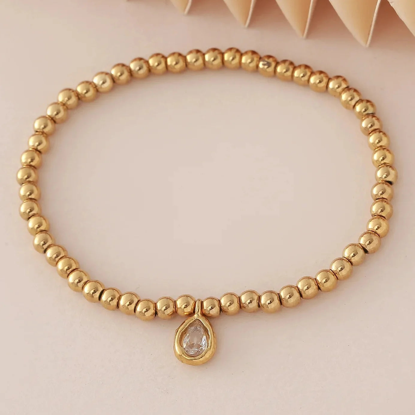 Bracelet doré avec pierre de naissance pour femme
