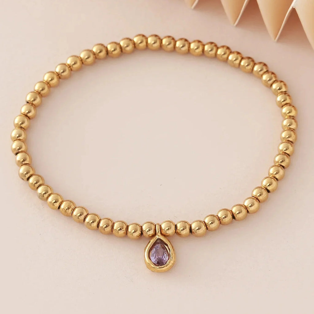 Bracelet doré avec pierre de naissance pour femme