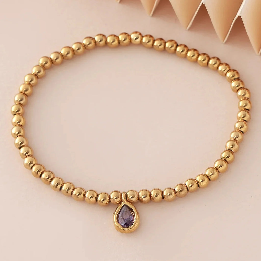 Bracelet doré avec pierre de naissance pour femme