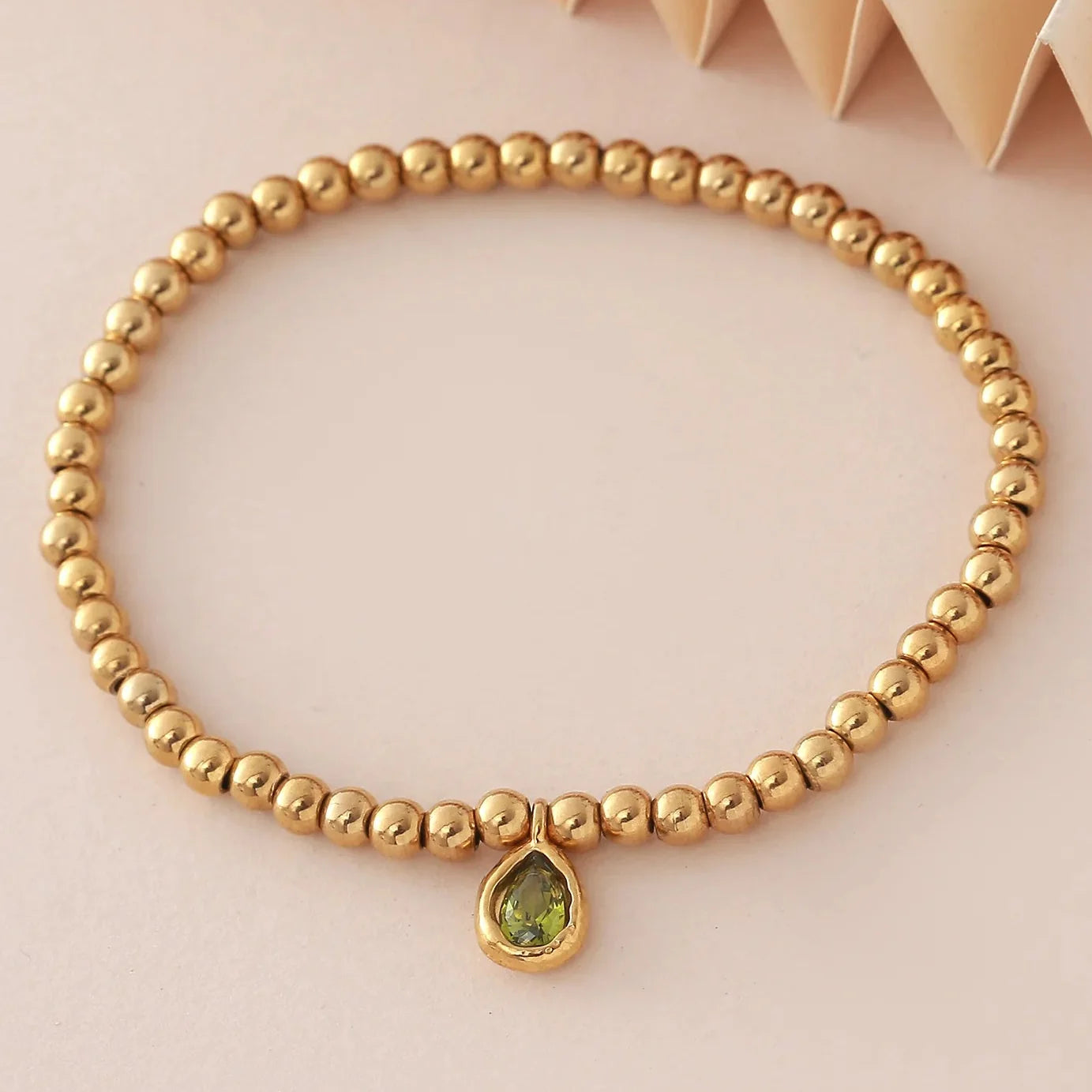 Bracelet doré avec pierre de naissance pour femme