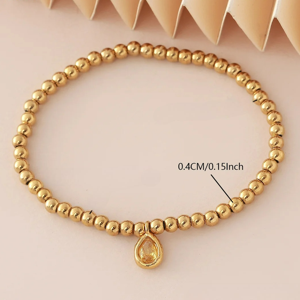 Bracelet doré avec pierre de naissance pour femme