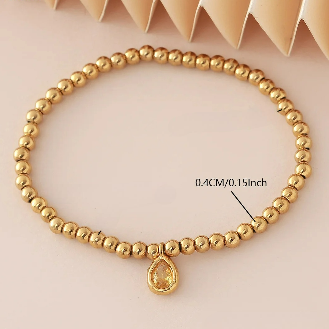 Bracelet doré avec pierre de naissance pour femme