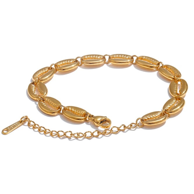 Bracelet doré coquillage cauri
