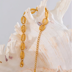 Bracelet doré coquillage cauri