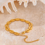 Bracelet doré coquillage cauri