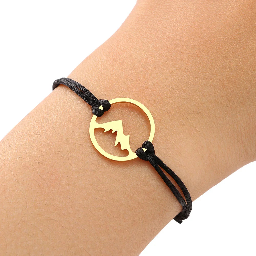 Rope Bracelet with Round Mountain Pendant 