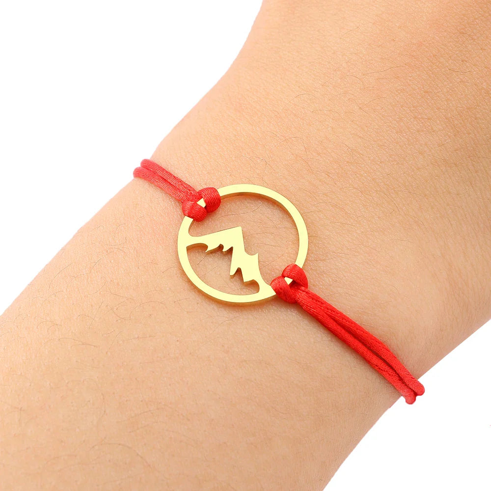 Rope Bracelet with Round Mountain Pendant 
