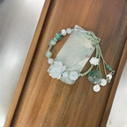 Cord Bracelet with Beads and Lotus Flower