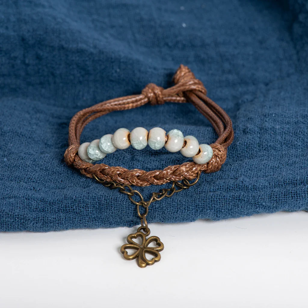Cord Bracelet with Four-Leaf Clover and Light Blue Beads
