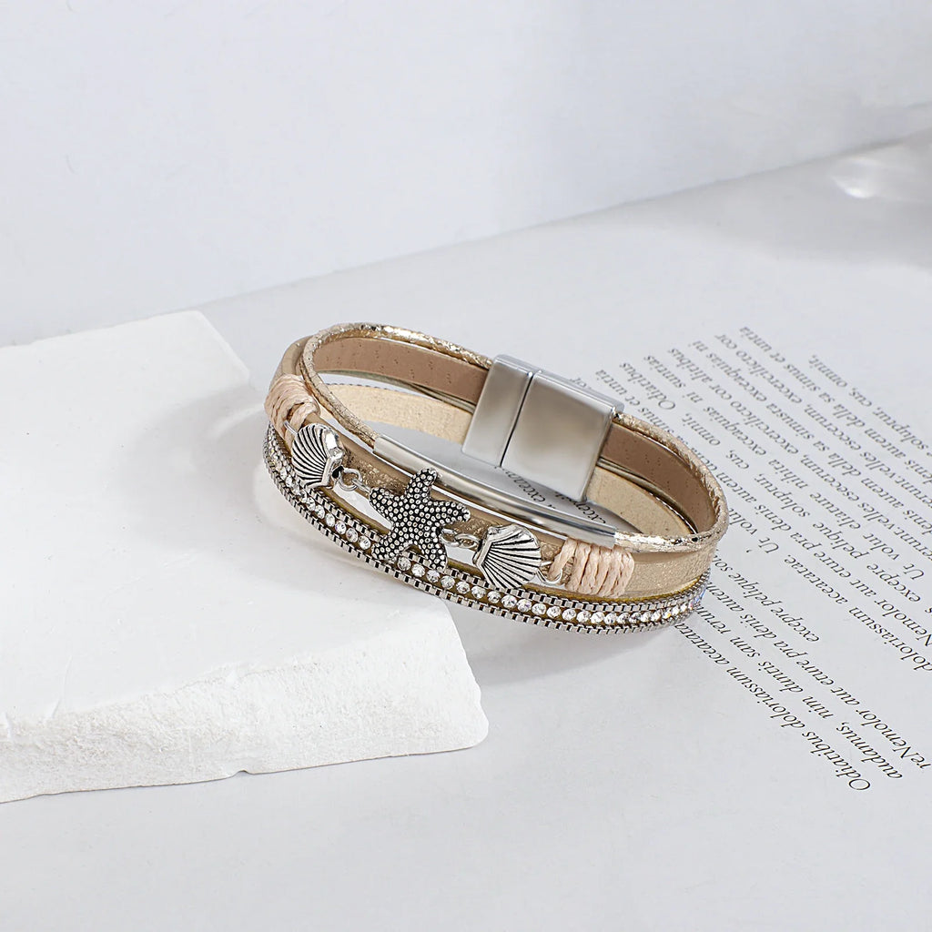 Bracelet en cuir coquillage et étoile de mer or blanc
