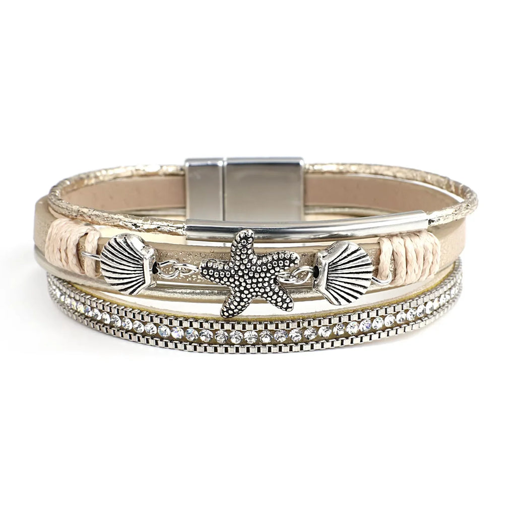 Bracelet en cuir coquillage et étoile de mer or blanc