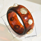 Bracelet en résine avec coquillage