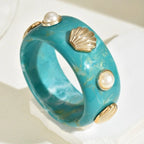Bracelet en résine avec coquillage vert