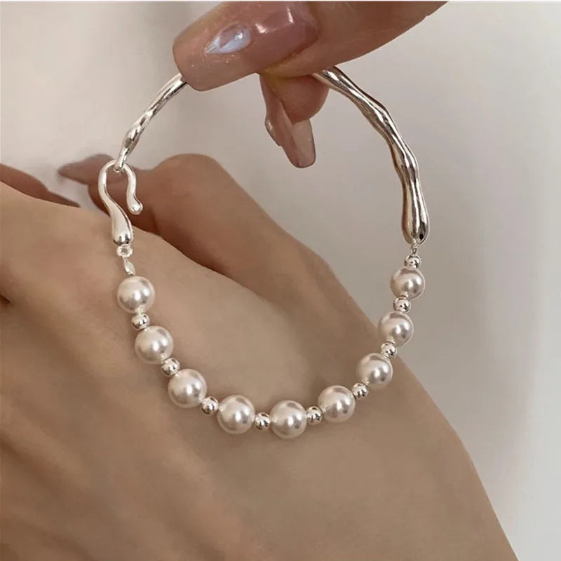 ID bracelet with beautiful white pearls
