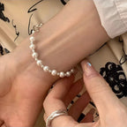 ID bracelet with beautiful white pearls