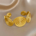 Bracelet manchette à motif spirale