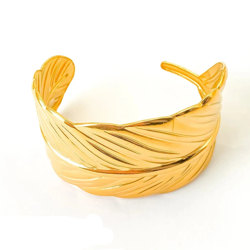 Bracelet manchette plume dorée
