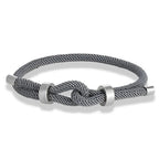 Bracelet moderne en corde tressée avec nœud gris