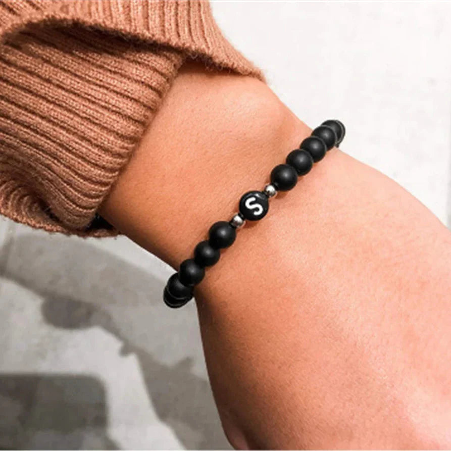 Bracelet noir initiale