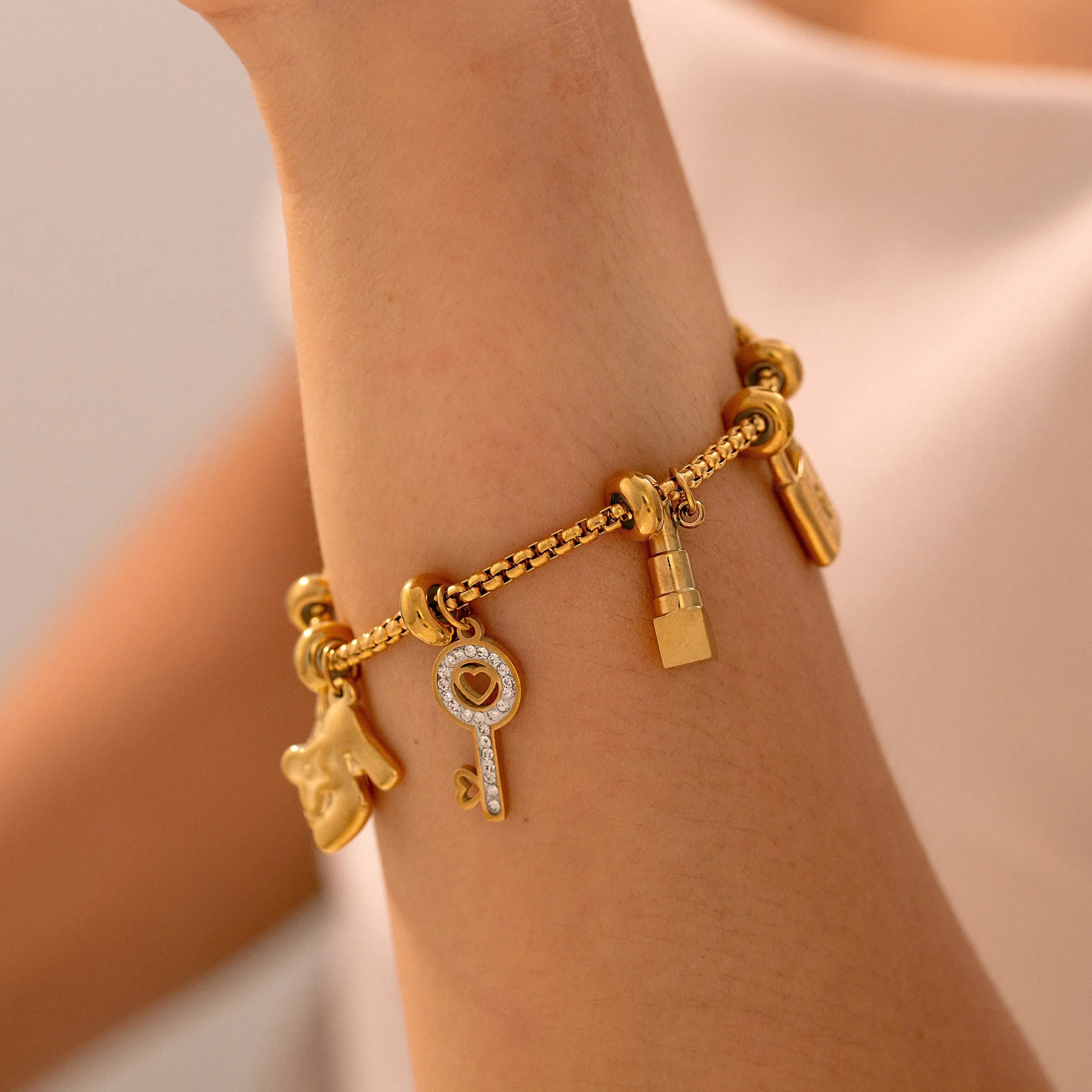 Bracelet femme avec clefs et cadenas or