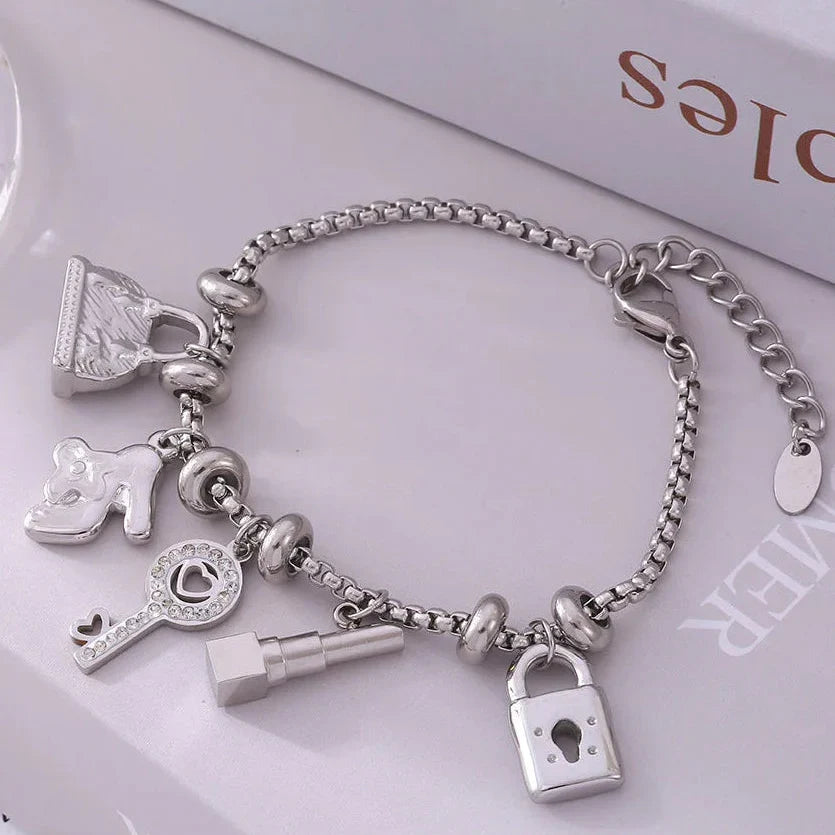 Bracelet femme avec clefs et cadenas argent
