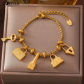 Bracelet femme avec clefs et cadenas or
