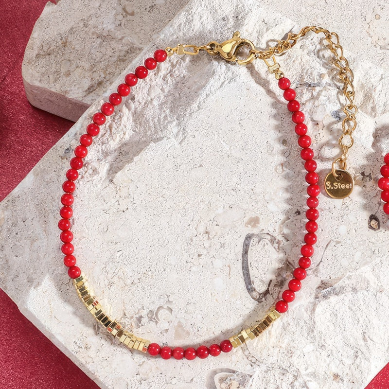 Bracelet rouge et doré corail