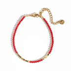 Bracelet rouge et doré corail