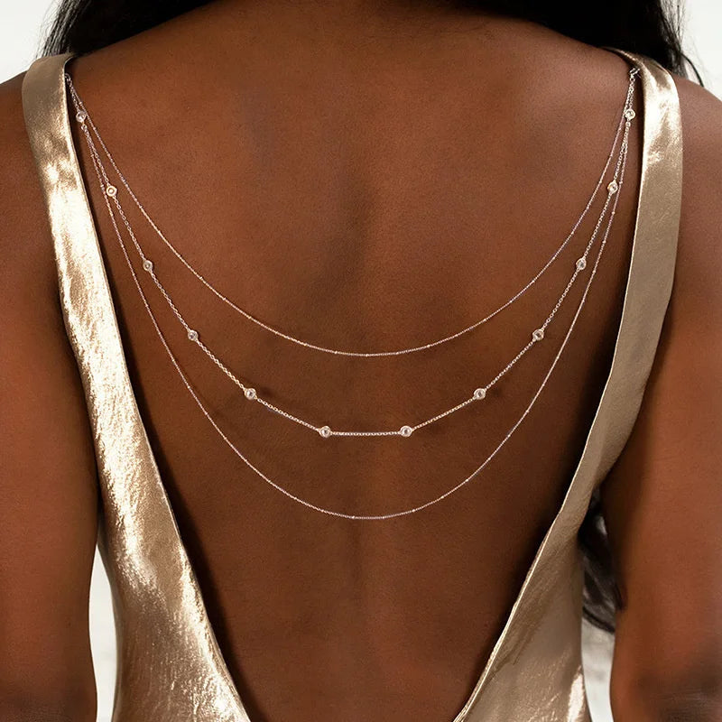Chaîne dorsale dorée pour femme - colliers de dos