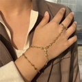 Chaîne pour main et doigt coeur - bracelet de main pour femme or