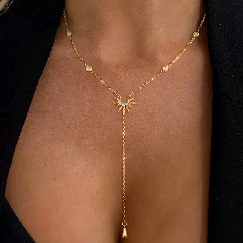 Necklace with Long Gold Sun Pendant