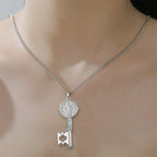 Collier avec pendentif clef catholique argent