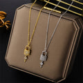 Collier avec pendentif clef et cadenas or