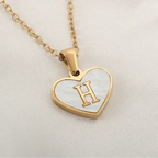 Collier avec pendentif coeur blanc initiale h