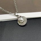 Necklace with Scallop Shell and Silver Pearl Pendant