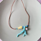 Necklace with Coral and Blue Fish Pendant